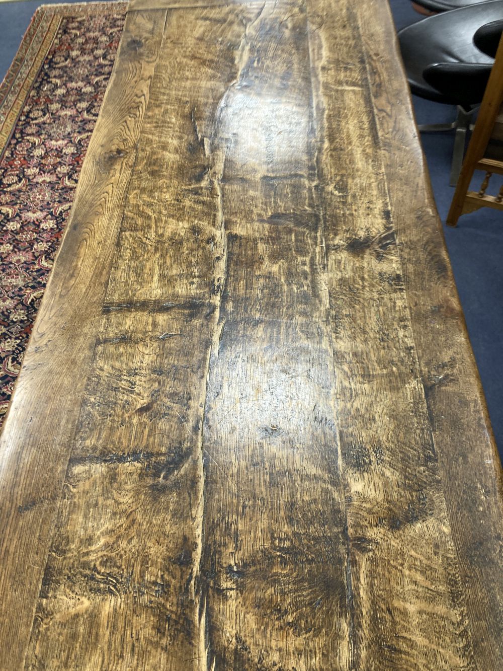 An oak refectory table on turned end supports, width 222cm depth 84cm height 77cm